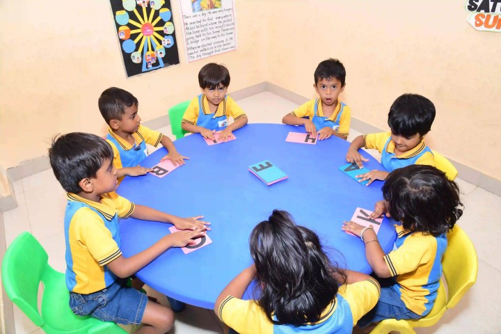 Happy preschool children during a learning activity